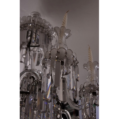 1882 - A large and impressive antique cut and faceted glass nine branch, twelve light chandelier, approx 86... 