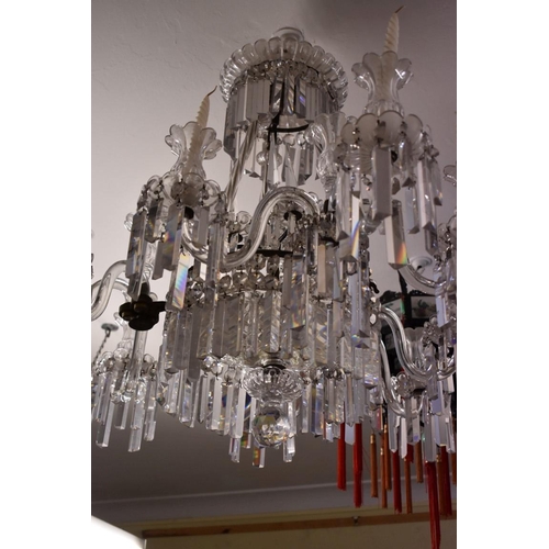 1882 - A large and impressive antique cut and faceted glass nine branch, twelve light chandelier, approx 86... 