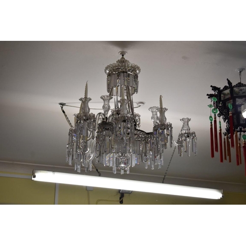 1882 - A large and impressive antique cut and faceted glass nine branch, twelve light chandelier, approx 86... 