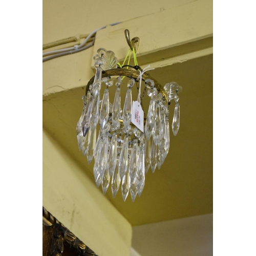 1884 - Two small brass and faceted glass chandeliers.