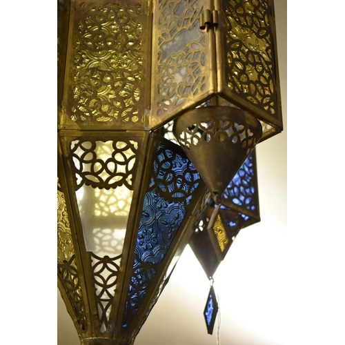 1890 - A Moroccan style brass and coloured glass octagonal lantern, 58cm high. 