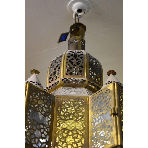 1890 - A Moroccan style brass and coloured glass octagonal lantern, 58cm high. 