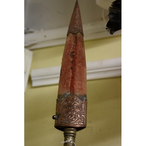 1961 - An Indian ceremonial spear, having ebony and brass mounted shaft and associated decorative sheath, 2... 