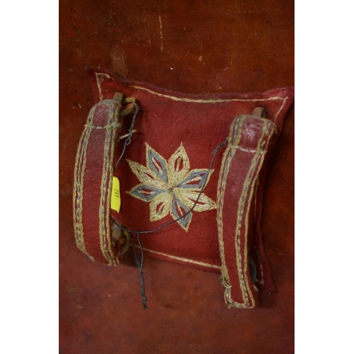 2009 - An Indian leather dahl shield, having decorative tooled edge, 52cm diameter.