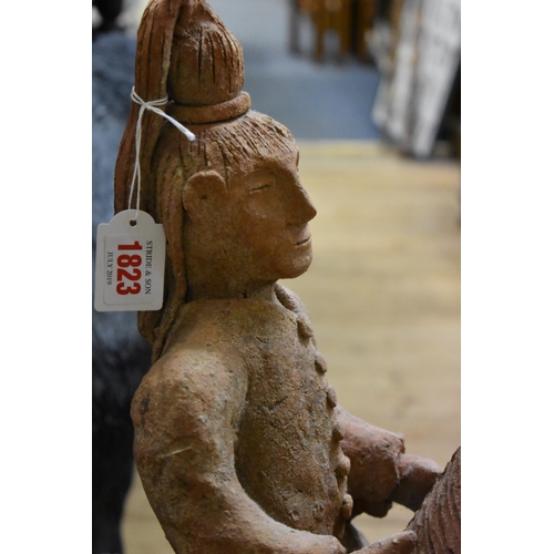 1823 - A Chinese terracotta Tang style figure on horse, 68.5cm high. 