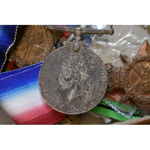 1840 - Medals: a quantity of British World War I and II medals; to include a World War I War medal to S E 3... 