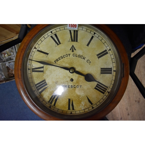 1509 - A mahogany circular wall clock, with 12in dial and fusee movement, with key and pendulum.... 