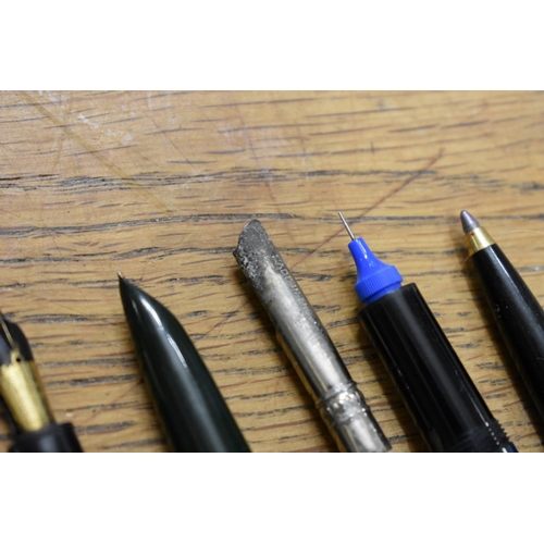 1857 - A quantity of fountain pens and pencils, to include: examples with 14ct nibs.