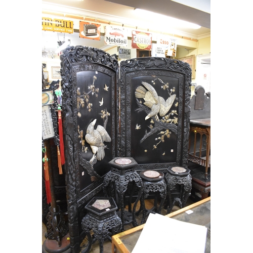 1469 - A large late 19th century Japanese carved wood and shibyama two fold screen, decorated in high relie... 