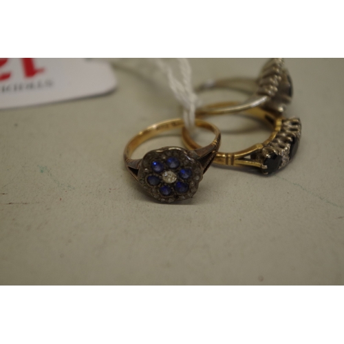 129 - Three sapphire and diamond gold rings, all stamped 18ct, 12.1g total weight.