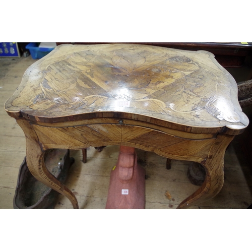 1334 - A Louis XVI kingwood and marquetry writing table, of serpentine outline, with sliding and ratcheted ... 