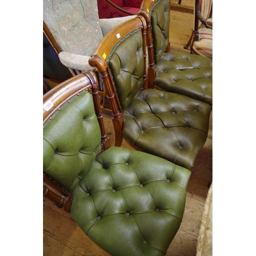 1366 - A set of three Victorian carved oak and buttoned green faux leather chairs. 