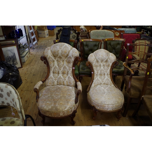 1369 - A pair of Victorian carved walnut and button upholstered occasional chairs. 