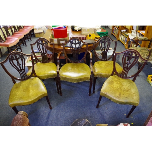 1372 - A set of five antique mahogany dining chairs, to include an elbow chair.