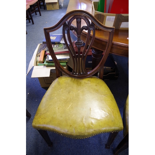 1372 - A set of five antique mahogany dining chairs, to include an elbow chair.