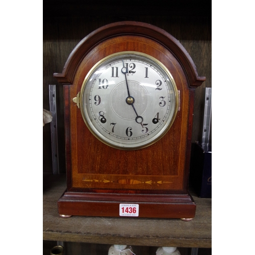 1436 - An Edwardian mahogany and inlaid mantel clock, striking on a gong, 31cm high, with pendulum.&nb... 