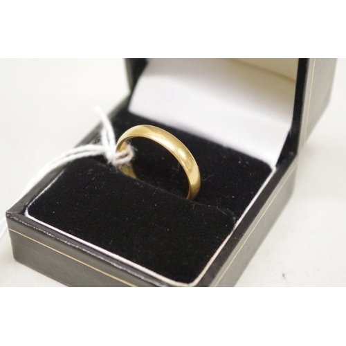 145 - Two gold wedding bands, stamped 22ct, 7.9g.