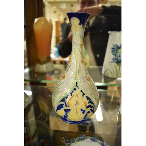 1507 - A Macintyre Florian Ware baluster vase, painted and printed marks, 20cm high, (restoration to r... 