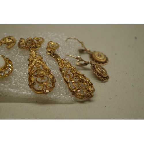 157 - Four pairs of gold earrings, stamped 375/9ct; together with another pair of costume studs.... 