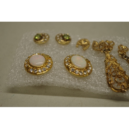 157 - Four pairs of gold earrings, stamped 375/9ct; together with another pair of costume studs.... 