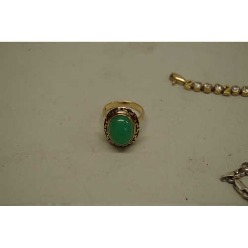 167 - A green jade set gold ring, stamped 14k; together with two Oriental jade pendants; and four other it... 