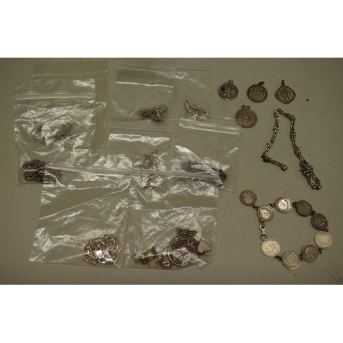 168 - A quantity of silver and other metal necklaces, bracelets etc.