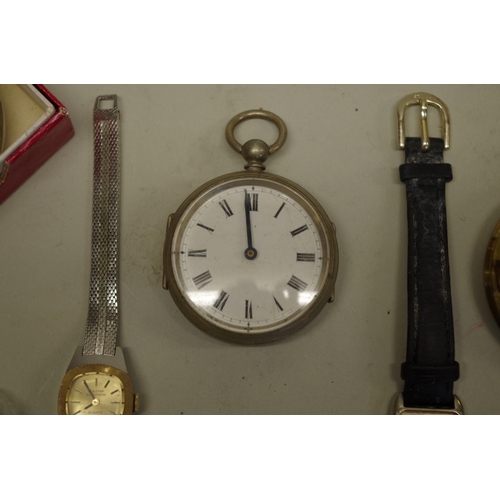 174 - A Gucci silver key ring; together with an ancient coin; other mixed coins; and an assortment of watc... 