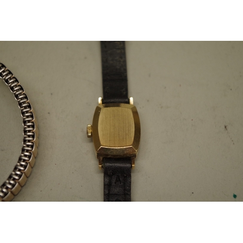 233 - Two Omega 9ct gold ladies wristwatches; together with a gold plated example. (3)