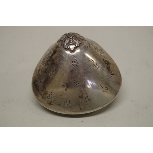 43 - A white metal hinged clam shell, 7.3cm wide.