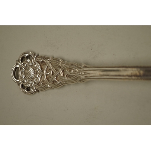 45 - An Arts & Crafts planished silver serving spoon, by Omar Ramsden, London 1928, Tudor Rose p... 