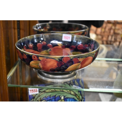 1531 - A William Moorcroft and Tudric pewter 'Pomegranate' pattern pedestal bowl, for Liberty, No.01309, 24... 