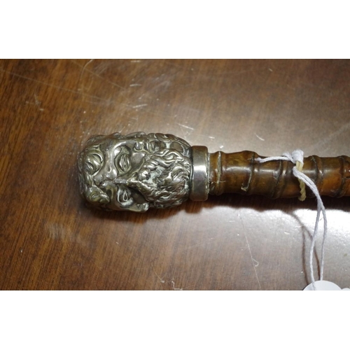 1617 - A novelty cane, the electroplate multi-faced pommel inscribed '146 New Bond St'.