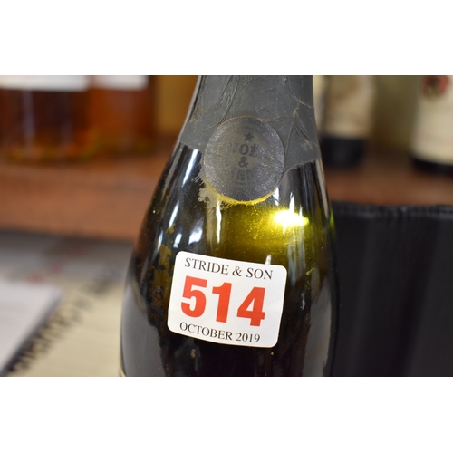 514 - An old half bottle of Moet & Chandon champagne.Provenance: by repute brought back from the trenc... 