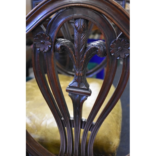 1372 - A set of five antique mahogany dining chairs, to include an elbow chair.