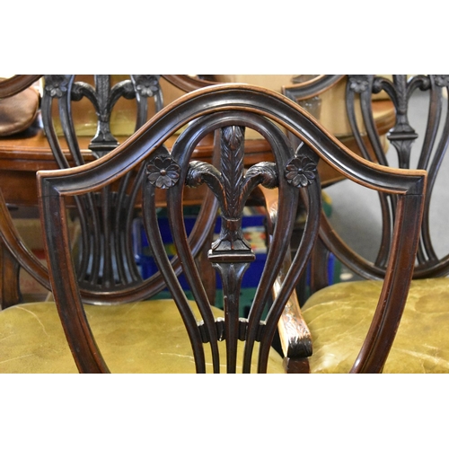 1372 - A set of five antique mahogany dining chairs, to include an elbow chair.