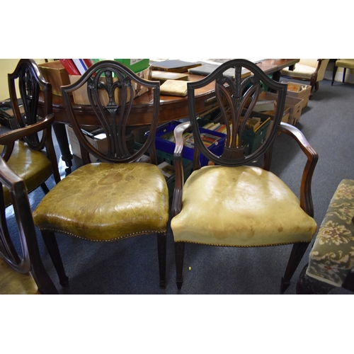 1372 - A set of five antique mahogany dining chairs, to include an elbow chair.