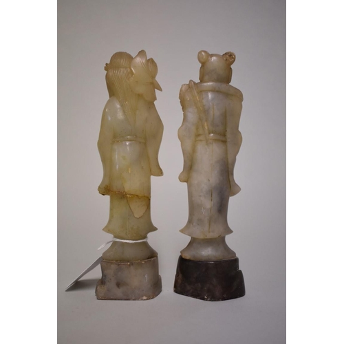 566 - A pair of Chinese soapstone figures, 18cm high, (one restuck). (2)