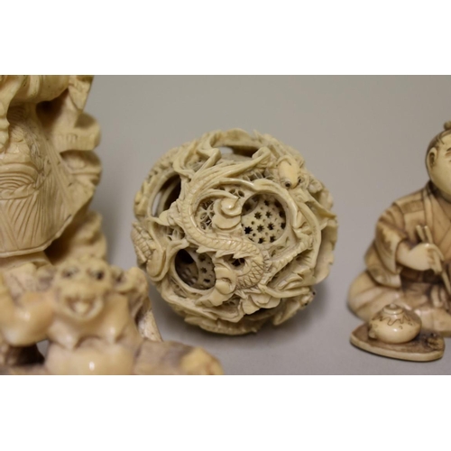 567 - A small group of Chinese and Japanese carved ivory, comprising: a seated figure, seal mark to base, ... 