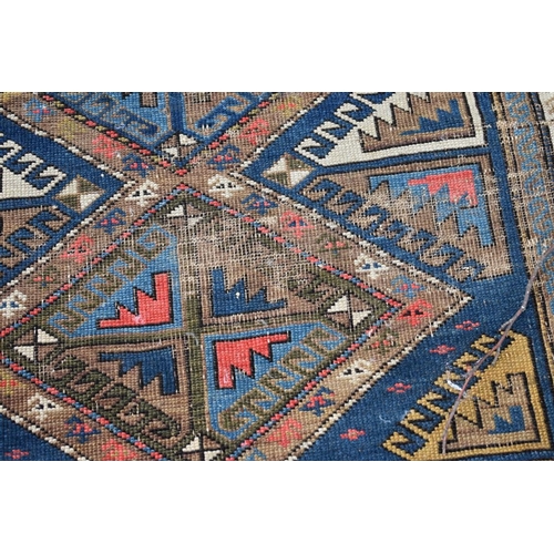 1102 - A Bokhara rug, having geometric design, 150 x 113cm.