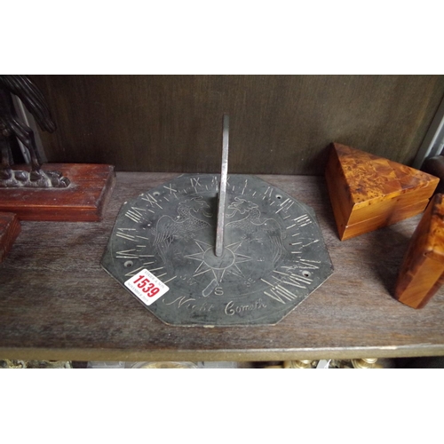 1539 - A bronze sundial, with gnomon, 20cm wide.