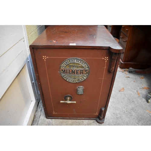 1186 - An old 'Milners' Patent Fire Resisting Special Safe', 64cm high x 48cm wide x 51.5cm deep, with key.... 