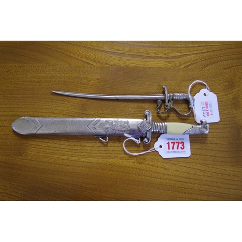 1773 - A miniature RAD dagger and sheath, and a miniature sword letter opener.