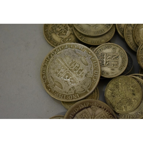 291 - Coins: a quantity of George V and George IV coinage, 175g.