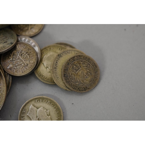 291 - Coins: a quantity of George V and George IV coinage, 175g.