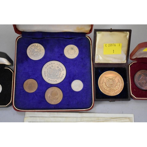 293 - Coins: a Sierra Leone 'First National Currency Independence 1961' six coin set; together with a Jers... 