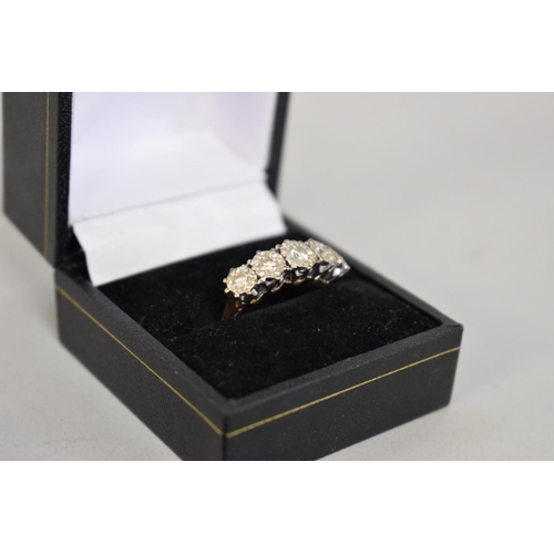 69 - A diamond five stone gold ring, hallmarked 18ct, 0.45ct approximately, 5.2g total weight.... 