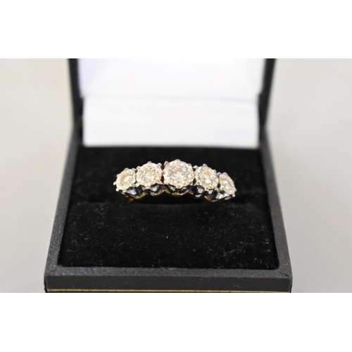 69 - A diamond five stone gold ring, hallmarked 18ct, 0.45ct approximately, 5.2g total weight.... 