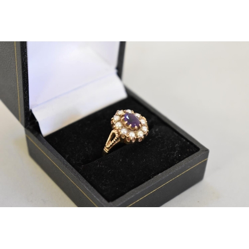 72 - An amethyst and pearl gold ring, hallmarked 9ct, 3.7g total weight.