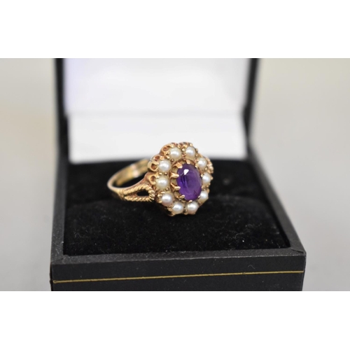 72 - An amethyst and pearl gold ring, hallmarked 9ct, 3.7g total weight.