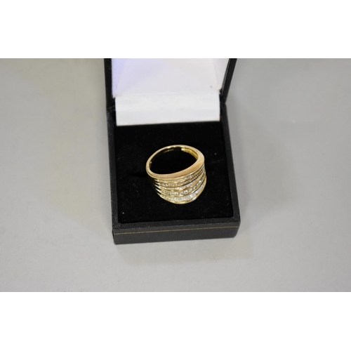 409 - A baguette and brilliant cut diamond set gold ring, hallmarked 9ct ring, 1ct approximately, 4.6... 